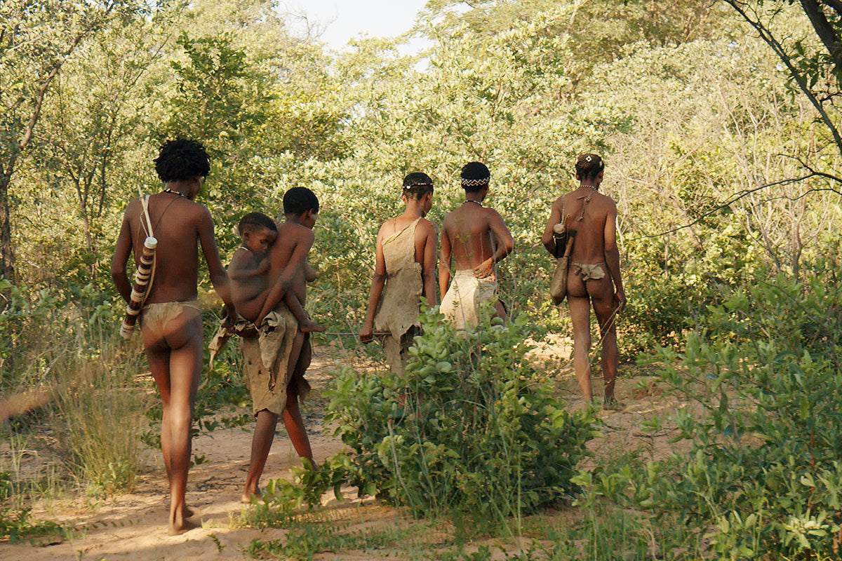Africans walking through the forest in Nambia